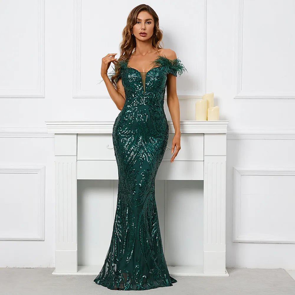 Add a little wildness to your wardrobe with this Feather Evening Dress. Make a chic statement, while taking risks in this lightweight, show-stopping dress crafted with luxurious feather fabric. Shine like the night sky in this risk-taker's pick.