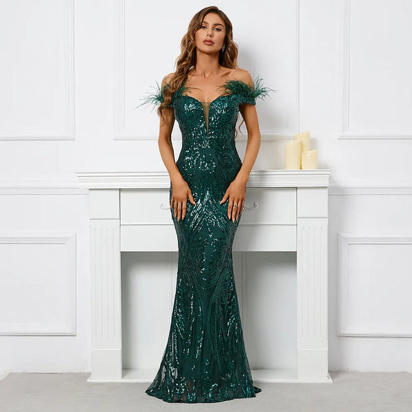 Add a little wildness to your wardrobe with this Feather Evening Dress. Make a chic statement, while taking risks in this lightweight, show-stopping dress crafted with luxurious feather fabric. Shine like the night sky in this risk-taker's pick.